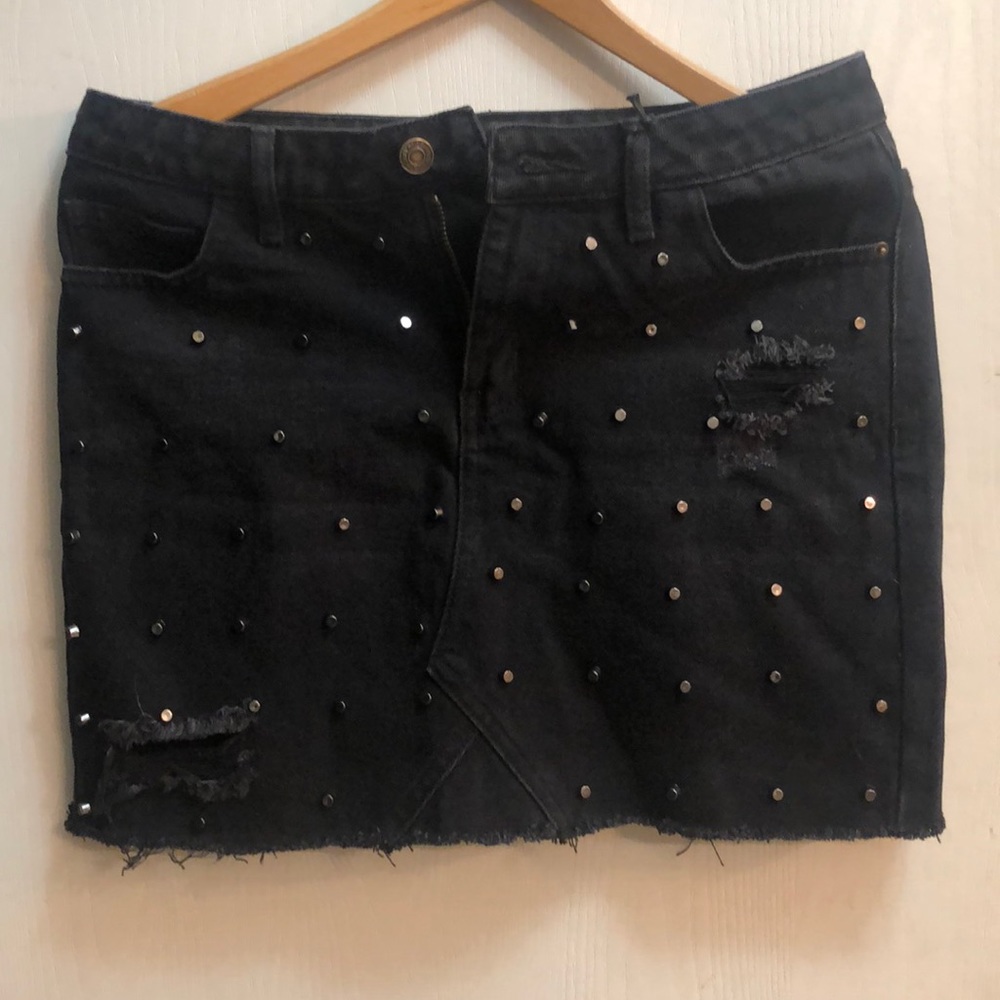 Mini skirt black size Medium. studded distressed